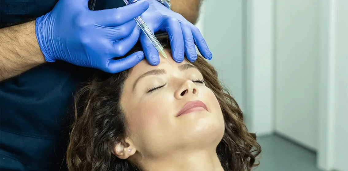 woman receiving wrinkle relaxant treatment